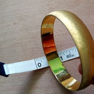 Brushed gold bangle